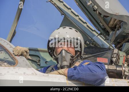 Military pilot in the cockpit of a jet aircraft Stock Photo