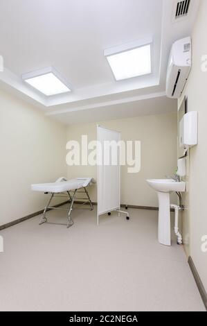 Massage room with empty table Stock Photo