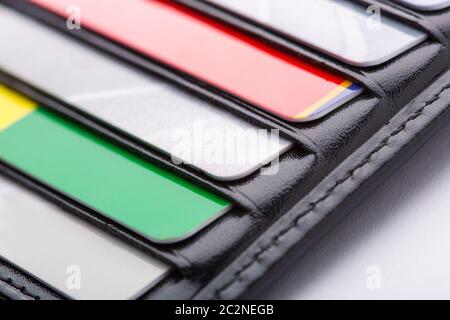 Black leather wallet with credit and discount cards Stock Photo