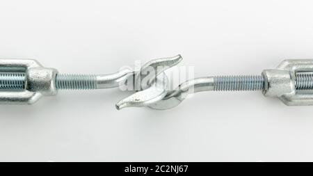 Two hooks connected on white Stock Photo