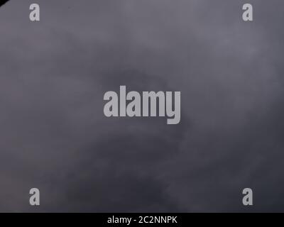Gray and dark storm clouds before the storm Stock Photo