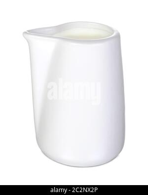 Closeup of a white ceramic creamer or saucier on a white background Stock Photo