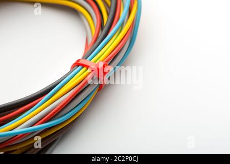 Bunch of multicolored wires isolated on white Stock Photo