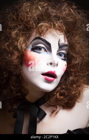 Woman mime with theatrical makeup. Close-up shot Stock Photo