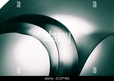 Abstract curves of paper sheets. Toned image Stock Photo