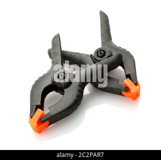 Two plastic clamps isolated on white background Stock Photo