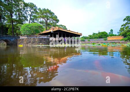 BACH LONG, GIAO THUY, NAMDINH, VIETNAM - JULY 10, 2016: Unidentified local farmers working on their fields for planting rice Stock Photo