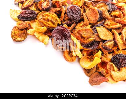 Mix of dried bits of  fruits isolated on white Stock Photo