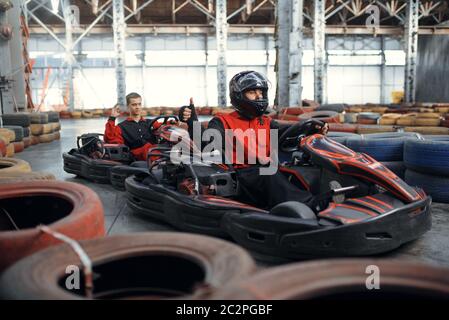 Two kart racers, karting auto sport indoor Stock Photo - Alamy