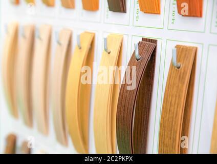 Wooden veneer samples palette closeup. Interline texture catalog. Face line wood decoration Stock Photo