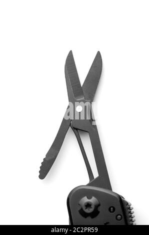 Black opened scissors on multitool knife isolated on white Stock Photo