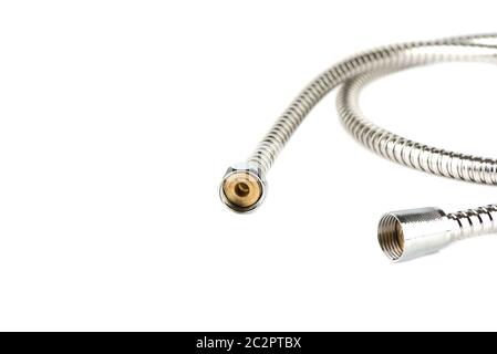 Connectors of a flexible hose for a shower in a bathroom on a white background. Copy space. Close up. Stock Photo