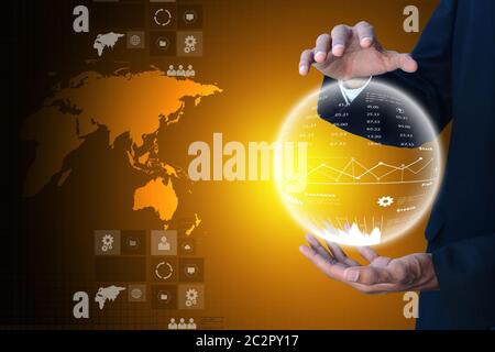 Business man showing the globe Stock Photo