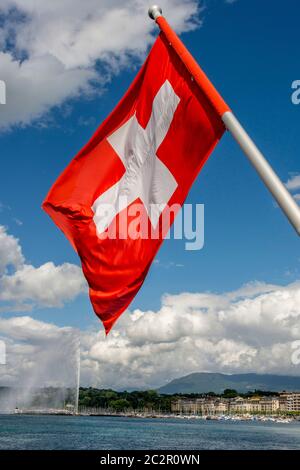 Swiss flag and jet d'Eau on lake Geneva. Geneva canton. Switzerland Stock Photo