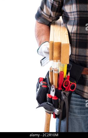 Carpenter isolated on a white background; he wears leather work gloves, he is holding wooden boards. Work tools industry construction and do it yourse Stock Photo