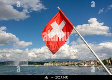 Swiss flag and jet d'Eau on lake Geneva. Geneva canton. Switzerland Stock Photo