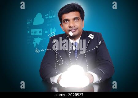 Business man showing concept of cloud computing. Stock Photo