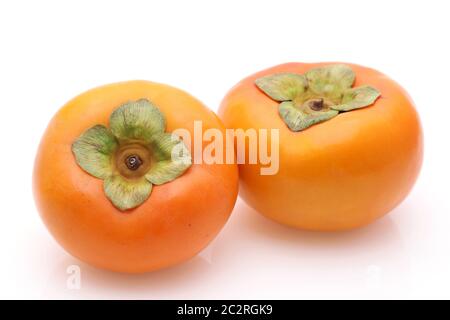 Close up of Persimmon fruit on white background Stock Photo