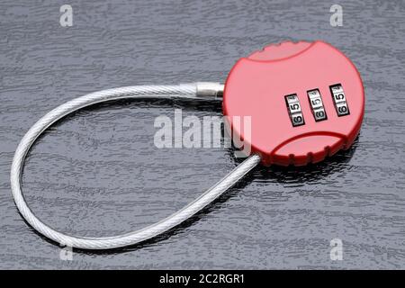 Red padlock lock isolated on black background Stock Photo