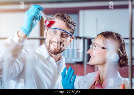 Scientists in the lab obtaining experimental data working diligently Stock Photo