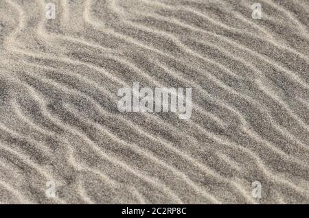 Ripples pattern as seen in sand on a beach. Stock Photo