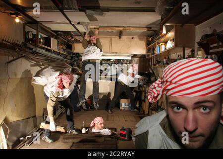Collage of foremans forking in garage Stock Photo
