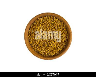 Bee pollen grains on a white background. Heap of bee pollen isolated on a white. Honey bee pollen over white background. Stock Photo