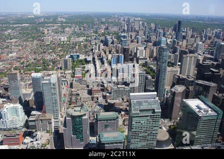 Toronto cityscape from Cn Tower with buildings, streets, railways and Lake Ontario, Ontario, Canada Stock Photo