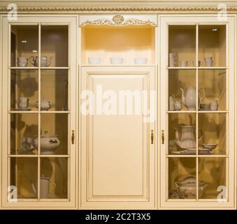 Kitchen cupboard made from light wood Stock Photo