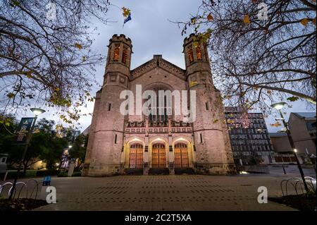 University of Adelaide's historic Bonython Hall illuminated at night on a cloudy day Stock Photo