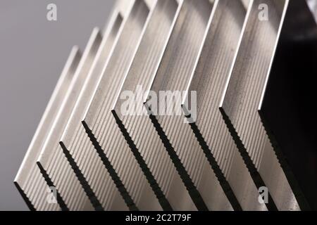 Image of metal radiator closeup picture isolated on gray Stock Photo