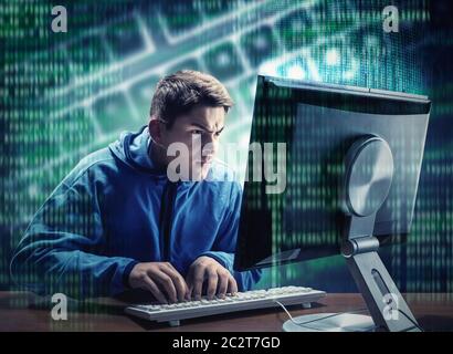 Hacker in is stealing information at home Stock Photo