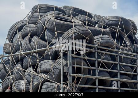 Used car tires being transported in a pickup truck. Stock Photo