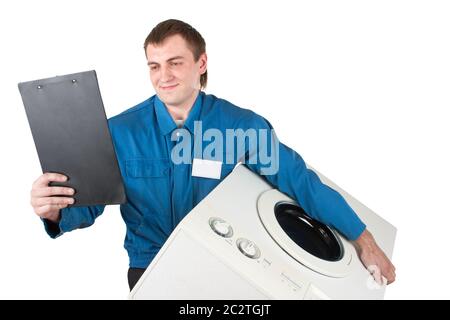 Repairman servicing washing machine. Isolated on white Stock Photo
