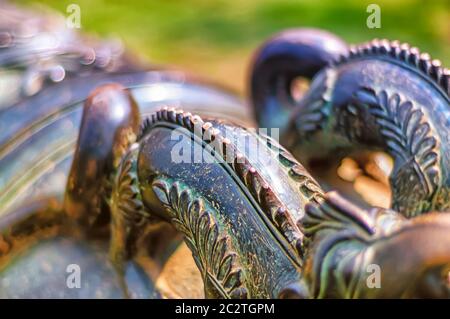 A pair of iron dragons forged atop the barrel of a cannon at Chowmahalla palace in Hyderabad, Telangana, India. Stock Photo