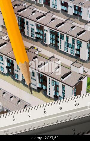 Pencil and ruler on architectural design of townhouses Stock Photo