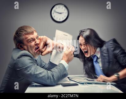 Mad fight of business people in office Stock Photo