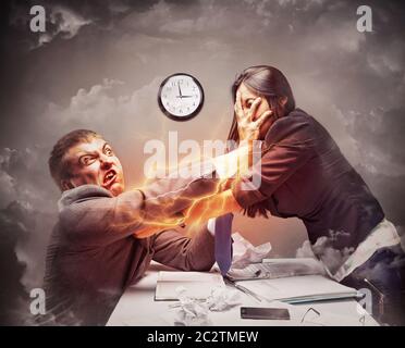 High stress fight in office Stock Photo