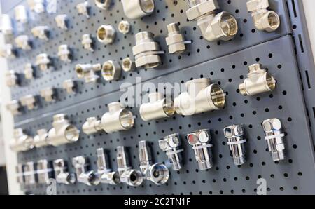 Set of pipe fittings and fixturing components of pipeline system for heating and water supply Stock Photo