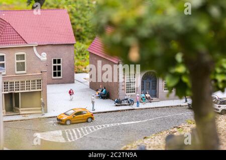 Fishing boat, cars and people on pier miniature scene outdoor, europe. Mini  figures with high detaling of objects, realistically diorama Stock Photo -  Alamy