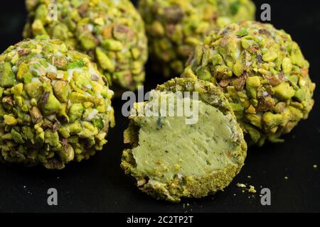 Theme sweet dessert cake handmade. Macro close-up dessert dessert sweet candy round ball white truffle ball set of white chocola Stock Photo