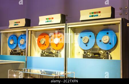 Retro calculating machine drives with magnetic tape in computer museum in USA Stock Photo