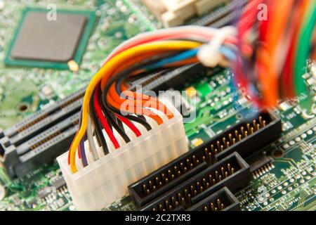 Computer motherboard power lines. Color cables Stock Photo