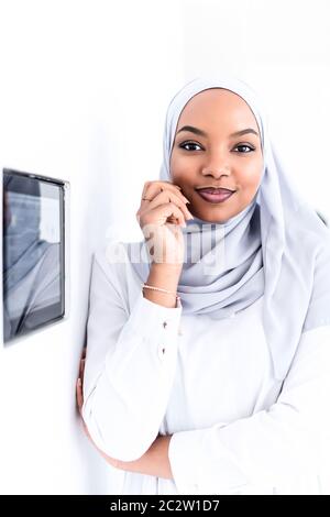 african woman using smart home screen Stock Photo