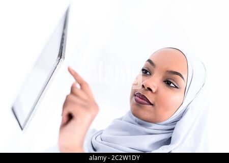 african woman using smart home screen Stock Photo