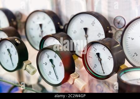 Manometers and pressure control gauges, plumbing equipment. Measure devices Stock Photo