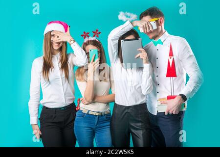 Business people celebrating New Year party and Christmas celebration. Office Christmas Party. Group Colleagues Having Fun New Ye Stock Photo
