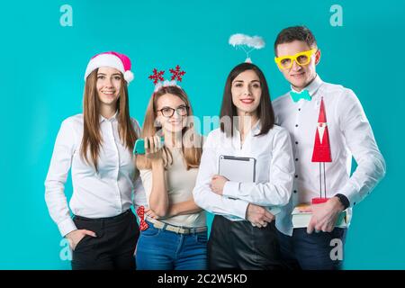 Business people celebrating New Year party and Christmas celebration. Office Christmas Party. Group Colleagues Having Fun New Ye Stock Photo