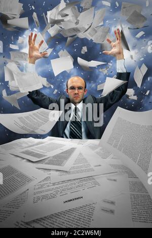 Serious businessman manipulating papers against dramatic blue sky Stock Photo