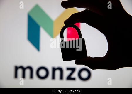 LONDON, UK - June 2020: Monzo online bank logo with security padlock silhouette Stock Photo